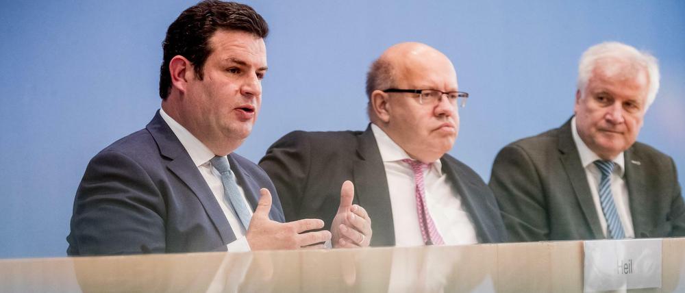 Arbeitsminister Heil (SPD), Wirtschaftsminister Altmaier (CDU) und Innenminister Seehofer (CSU)