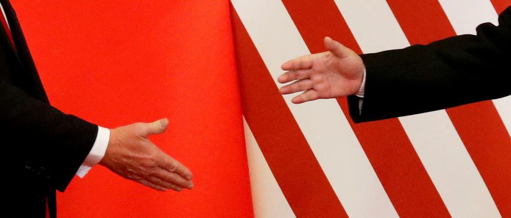 Hand drauf: Ein Handelskrieg zwischen den beiden Großmächten USA und China scheint abgewendet.