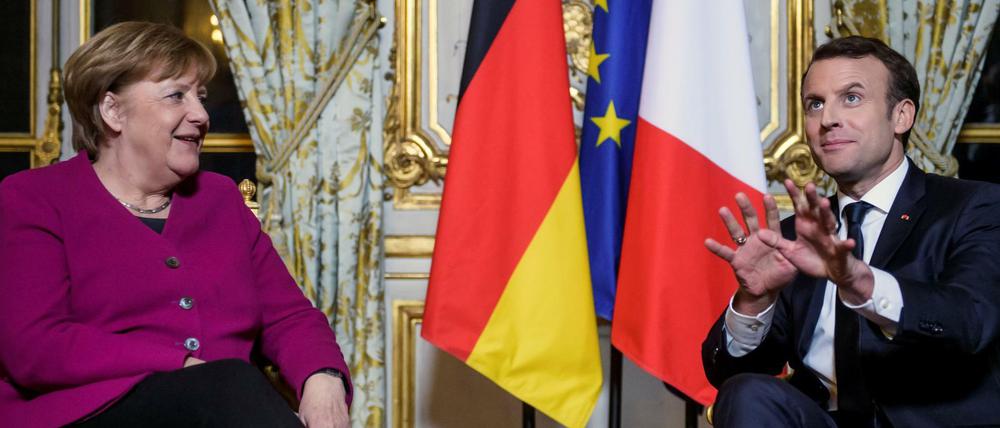 Große Pläne: Frankreichs Präsident Macron im Gespräch mit Angela Merkel. 