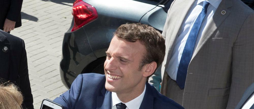 Frankreichs Präsident Emmanuel Macron und Alexandre Benalla (rechts). 