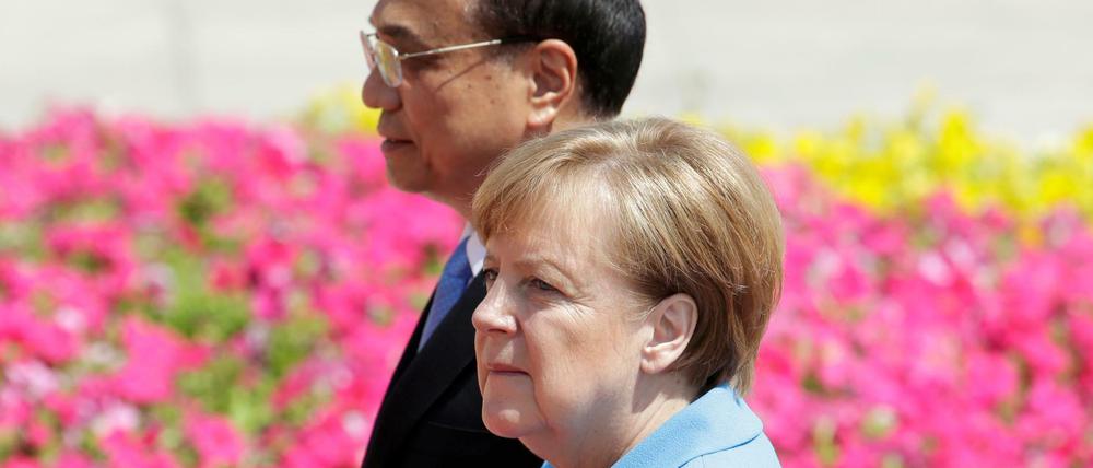 Die deutsche Kanzlerin Angela Merkel und der chinesische Premierminister bei einem Treffen 2018.