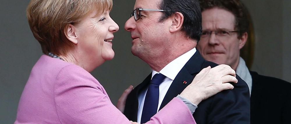 Bundeskanzlerin Angela Merkel und Frankreichs Staatschef François Hollande am Freitag in Paris.