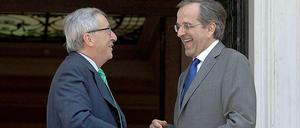 Der designierte EU-Kommissionschef Juncker (links) und Griechenlands Premier Samaras am Montag in Athen.