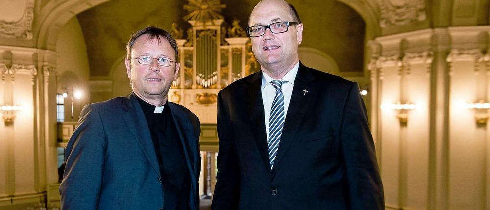 Unterwegs im Namen des Herrn: Karl Jüsten (l.) vertritt die katholischen Bischöfe, Martin Dutzmann die evangelische Kirche in der Bundeshauptstadt.