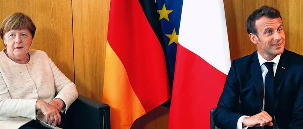 Zu Beginn des EU-Gipfels sind die Meinungsunterschiede zwischen Angela Merkel und Emmanuel Macron zu spüren. 