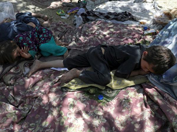 Vertriebene suchen suchen Zuflucht in einem öffentlichen Park in Kabul.