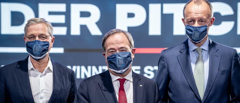 Die drei Kandidaten für den Bundesvorsitz der CDU: Norbert Röttgen (l), Armin Laschet (M) und Friedrich Merz (r).