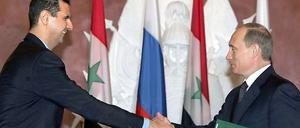 Alte Freund. Syrien Machthaber Assad und Wladimir Putin.