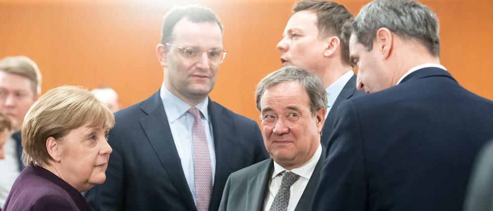 Angela Merkel, Jens Spahn, Armin Laschet (alle CDU) und Markus Söder (CSU).