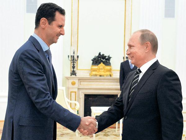 Der russische Präsident Wladimir Putin mit Syriens Machthaber Bashar al-Assad