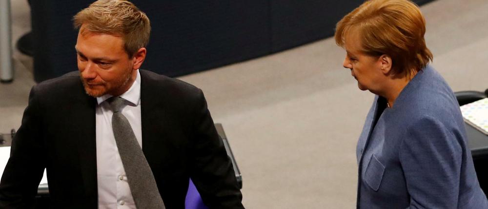Angela Merkel und Christian Lindner im Bundestag.