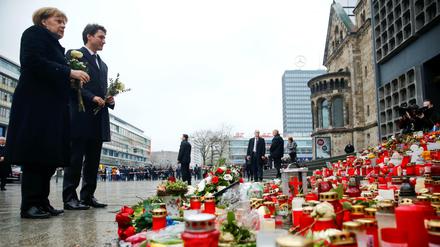 Kanzlerin Merkel und Kanadas Premier Trudeau gedenken der Opfer des Anschlags auf den Berliner Weihnachtsmarkt.