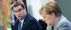 CSU-Chef Söder und Kanzlerin Merkel informieren zur Corona-Krise. 