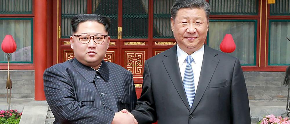 Kim Jong Un bei seinem Treffen mit Chinas Präsident Xi Jinping in Peking.