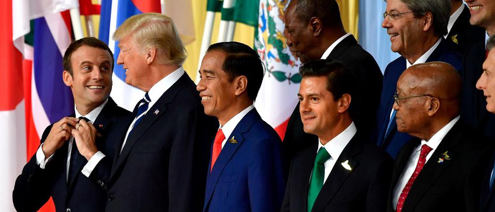 Gute Stimmung beim G20- Familienfoto.