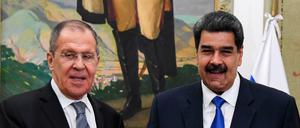Venezuelas Präsident Nicolas Maduro (rechts) empfängt Russlands Außenminister Sergej Lawrow.