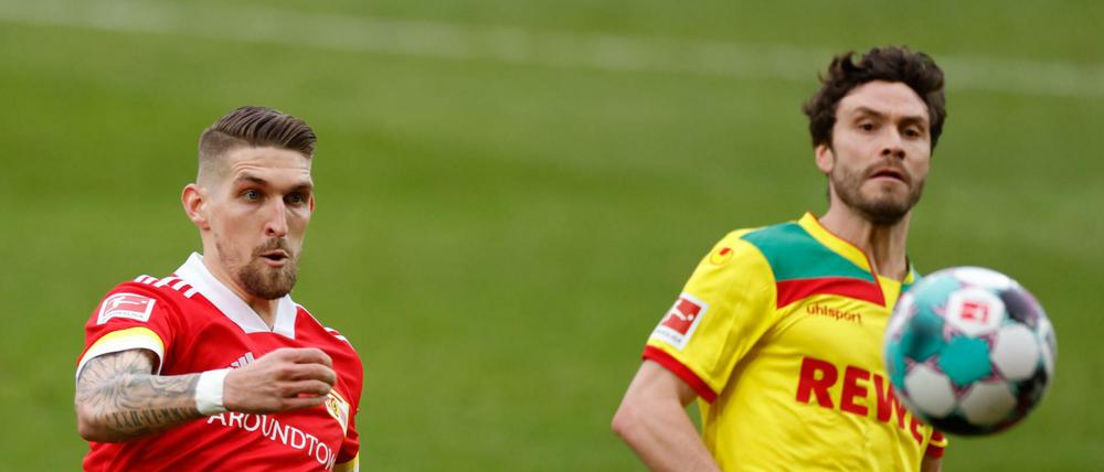 Robert Andrich (links) gewann mit dem 1. FC Union am Samstag 2:1 gegen Köln (rechts Jonas Hector).