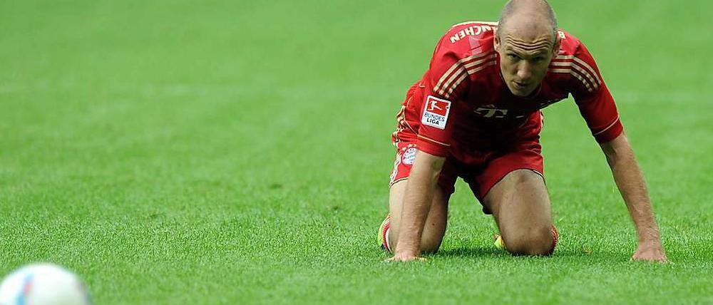 Am Boden. Bayerns Arjen Robben.
