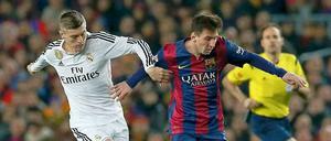 Toni Kroos und Lionel Messi.