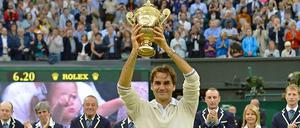 So sehen Sieger aus: Roger Federer hat zum siebten Mal in Wimbledon gewonnen. 