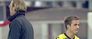 Servus, mach's guat! Mario Götze (r.) ist unter Trainer Jürgen Klopp zum Star der Dortmund-Elf geworden. Jetzt ist er auch von seinem Förderer nicht mehr zu halten.