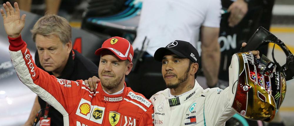 Arm in Arm. Vizeweltmeister Vettel und Weltmeister Hamilton freuen sich auf die Winterpause.