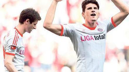 Zwei Mann, zwei Tore. Thomas Müller (links) und Mario Gomez erzielten die Treffer beim Sieg der Bayern gegen Stuttgart.