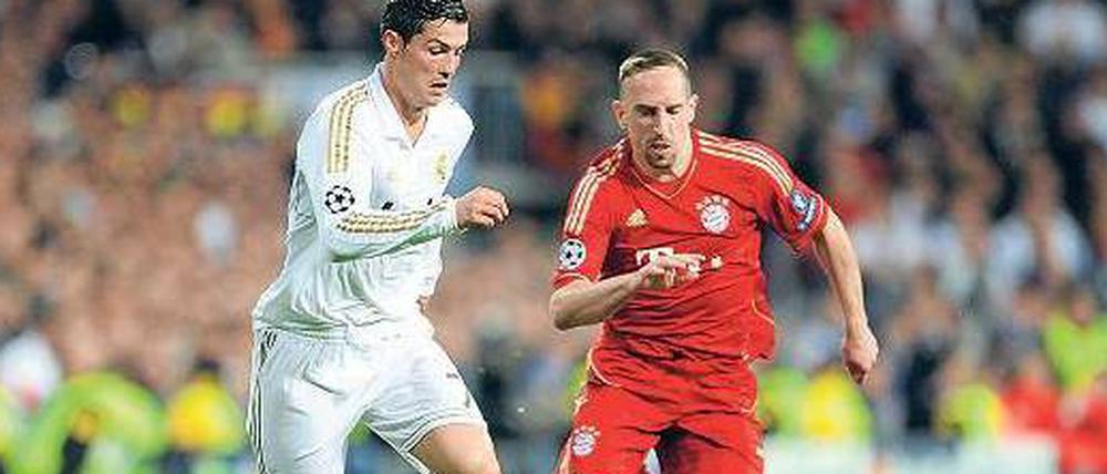 Wer ist die größere Bestie? 2012 warf Bayern um Franck Ribéry (r.) Cristiano Ronaldo und Real Madrid im Halbfinale aus der Champions League.