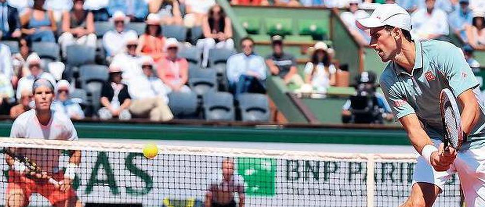 Dauerduell. Novak Djokovic (im Bild vorn) und Rafael Nadal treffen im Endspiel bereits zum 42. Mal aufeinander.