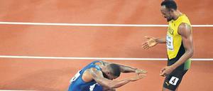 Verbeugung vor dem Größten. Weltmeister Gatlin verneigt sich vor der Legende Bolt.