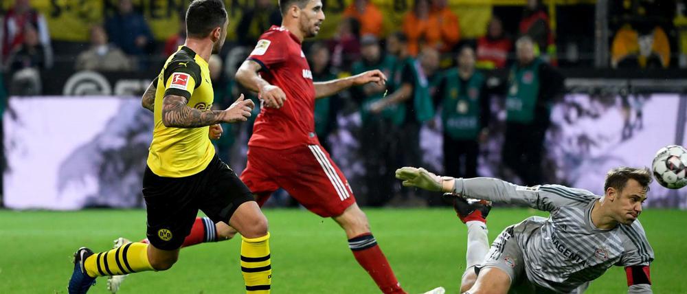Trotz Neuer. Paco Alcácer (l.) trifft für Dortmund im Hinspiel.