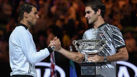 Hand drauf! Nadal und Federer sind auf dem Tennisplatz wie füreinander geschaffen.