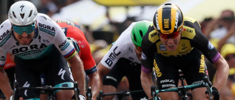 Hauchdünn. Mike Teunissen (r.) gewinnt die Auftaktetappe der Tour de France vor Peter Sagan.