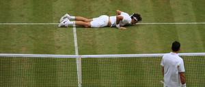 Milos Raonic sah Roger Federer fallen.