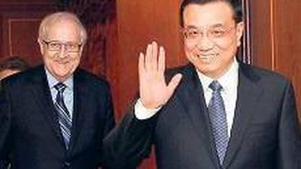 Gemeinsam lächeln. Vize-Premier Li Keqiang und Minister Rainer Brüderle.
