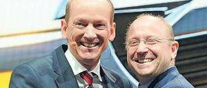 Gute Miene zum schwierigen Spiel. Opel-Chef Karl-Thomas Neumann (links) lächelt mit GM-Vize Stephen Girsky in Genf um die Wette. Zu lachen gibt es aktuell wenig. Foto: dpa