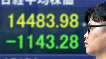 Absturz. Die Börse in Tokio brach am Donnerstag um mehr als sieben Prozent ein. 