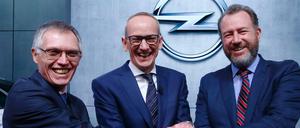 Beschlossene Sache: PSA-Chef Carlos Tavares, Opel-CEO Karl-Thomas Neumann und Dan Ammann, Präsident von General Motors (v.l.)