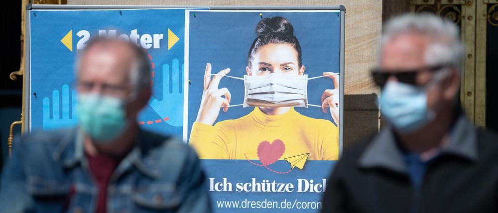 In Dresden werden 200.000 Mundschutzmasken an Bürger verteilt.