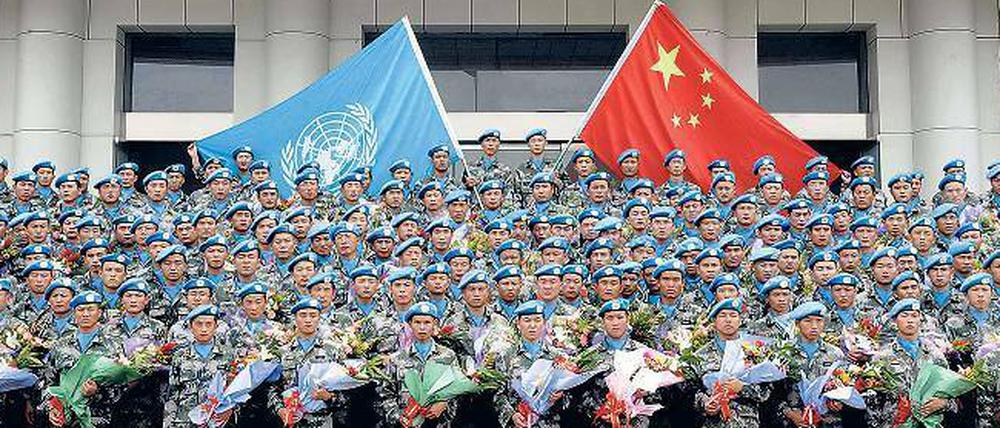 Engagiert. Seit Beginn des Jahrhunderts entsendet China das größte Blauhelm-Kontingent aller Staaten mit Sitz im Ständigen Ausschuss des Sicherheitsrats in andere Länder.