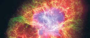 Gammaschleuder. Bei einer Sternenexplosion werden unter anderem Gammastrahlen ins Universum abgestrahlt. Die Abbildung zeigt den Krebsnebel, den Rest einer Supernova im Sternbild Stier. 
