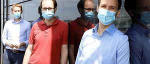 Florian Klein, Matthias Zehner und Christoph Kreer (von links) von der Uniklinik Köln haben Teile der Entwicklung von Antikörpern gegen Sars-CoV-2 entschlüsselt und hochpotente neutralisierende Antikörper gegen das Virus gefunden.